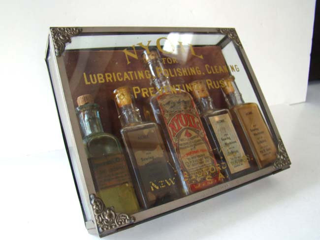 A RARE original Whale Oil display case for NYOIL containing 5 bottles circa 1890-1900 — image 6
